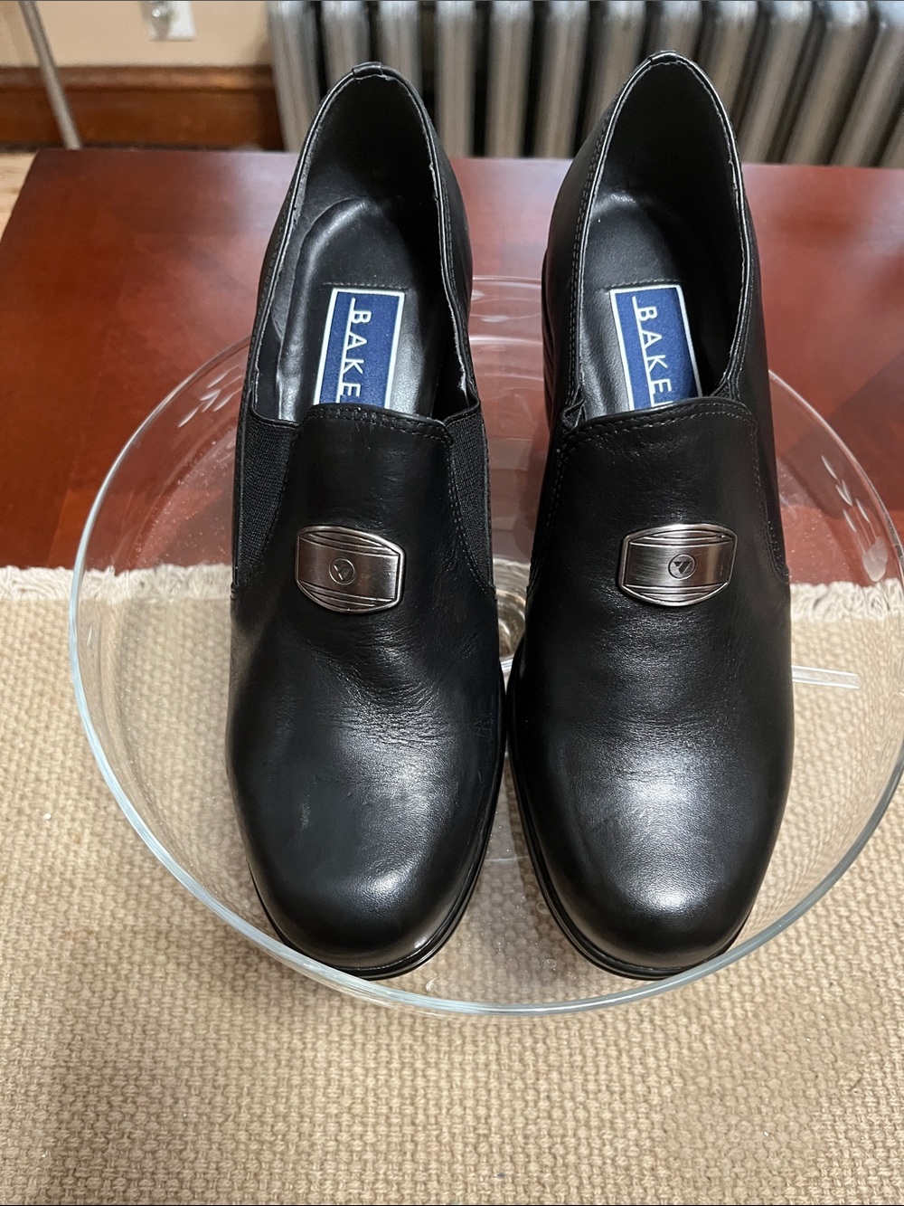 Bakers Black Leather Slip-On Loafers with Silver Emblem